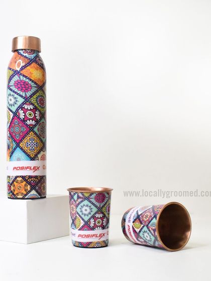 A closer look at the vibrant, custom-printed copper bottle and cup set for Posiflex. The traditional design makes it a unique and culturally relevant gift.