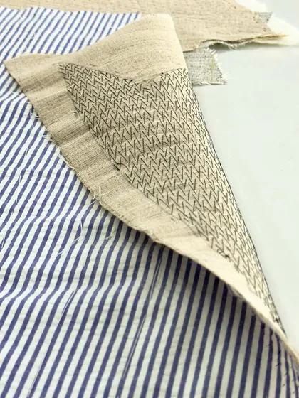 Here you can see the art of pad stitching, or 'Kulti' as we call it in India. This traditional Savile Row technique involves stitching the hair canvas to the jacket fabric by hand. It’s this meticulous process that creates the graceful, natural lapel roll that defines a truly bespoke jacket.