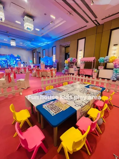 A fun and practical setup with our colorful chairs and tables ready for activities. The tables are covered with coloring sheets and stickers, providing built-in entertainment for the kids.