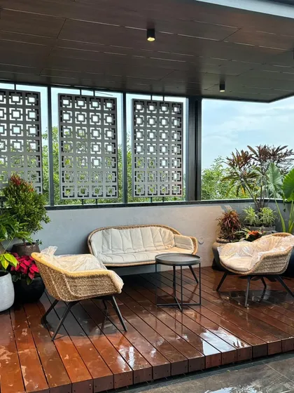A perfect spot for evening chai, this terrace features a custom deck and pergola with decorative jaali screens for added privacy and style. This project for Mr. Prabhu in Indira Nagar shows how we create intimate, functional outdoor nooks.