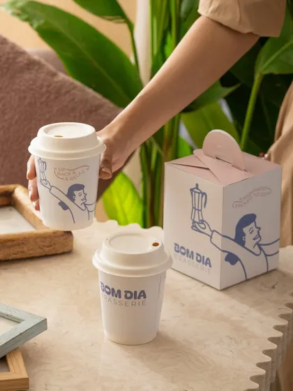 Highlighting the beautiful branding and packaging of Bom Dia cafe. This shows appreciation for a client's brand identity.