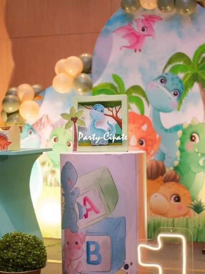 A detailed shot of the main table, showing the custom-printed plinth and the beautifully illustrated backdrop.