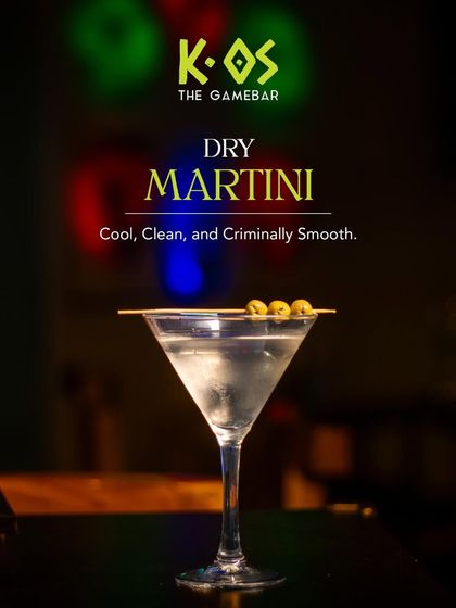 Cool, clean, and criminally smooth. A classic Dry Martini, garnished with olives, is always a good choice.