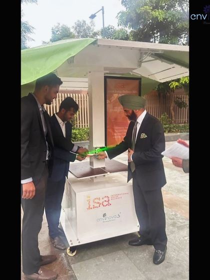 The inauguration of our Smart Solar Hut at the Ministry of New and Renewable Energy (MNRE) headquarters in Delhi. Shri Bhupinder Bhalla, Secretary to the Government of India, MNRE, officiates the ribbon-cutting, marking a significant endorsement of our technology.
