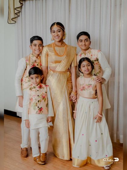 A full family portrait. It's a privilege to be part of these moments, ensuring everyone from the bride to the little ones looks their best.