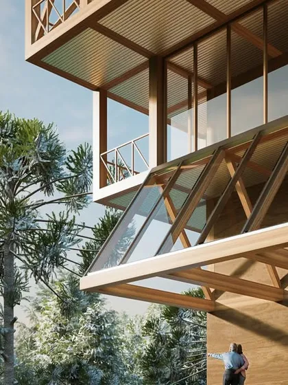 A close-up of the hotel entrance in Kashmir, highlighting the connection between the timber frame and the glass-enclosed walkways. The design emphasizes transparency and a seamless integration with the surrounding pine forest.