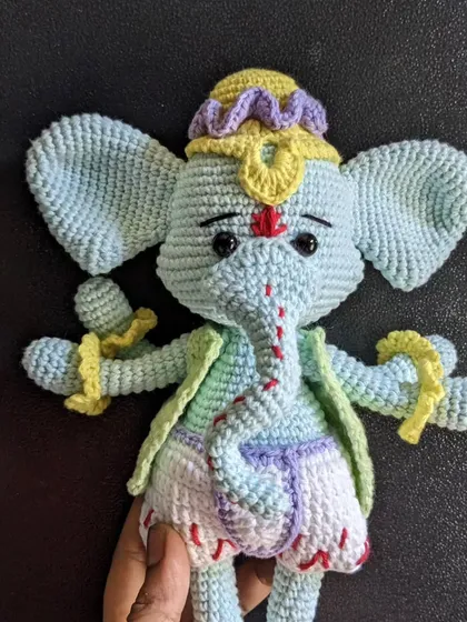 A beautiful, light-blue version of Lord Ganesha, showing a different color palette for these sacred figures.