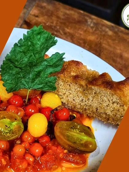 A beautiful dish from our 'Celebrating Mulberries' event. Here, farm-fresh tomatoes and mulberries are paired with a slice of savoury cake, showcasing how seasonal fruits can be used in creative ways.