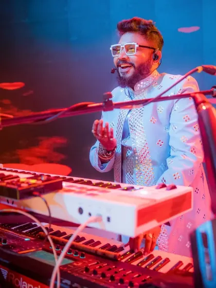 Our keyboardist having a great time on stage, his energy spreading to the audience.