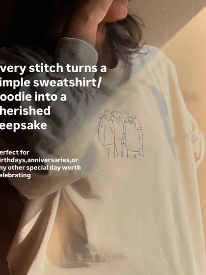 Every stitch turns a simple sweatshirt into a cherished keepsake. This image perfectly captures how a photo can become wearable art.