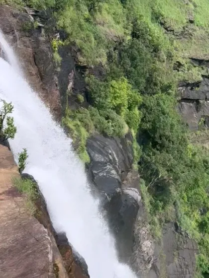 A close-up view of the water gushing down the rocks at Bandaje Falls.