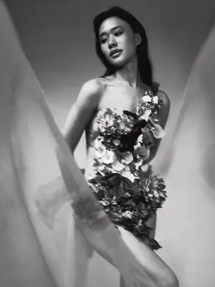 A black and white version from the 'Ophelia' series, stripping away the color to focus on form, light, and emotion. The motion blur of the fabric creates a soft, dreamlike quality.