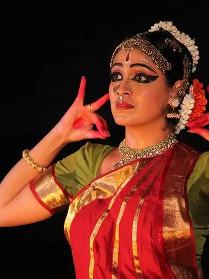 A performance showcasing the expressive art of Bharatanatyam. Our curriculum covers everything from basic adavus to intricate abhinaya, preparing students for the stage.