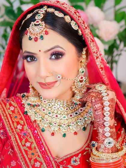 Another angle from the same session, showcasing the hand jewelry and henna design.