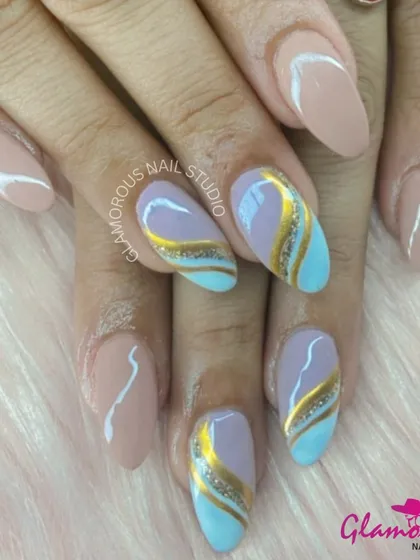 A beautiful combination of pastel colors and metallics. This design features abstract swirls of nude, baby blue, and gold glitter, creating a look that is both soft and glamorous.