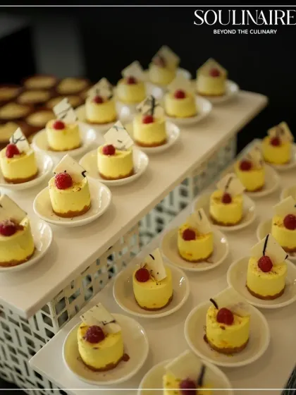 A display of mini cheesecakes at the Tata Harrier EV launch at Buddh International Circuit. Our catering matches the high-octane energy of premier automotive events with dynamic and elevated flavours.