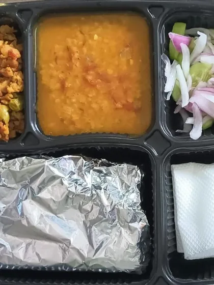 A healthy and protein-rich thali with dal and soya nutrela keema. This is a great vegetarian option that is both delicious and nutritious.