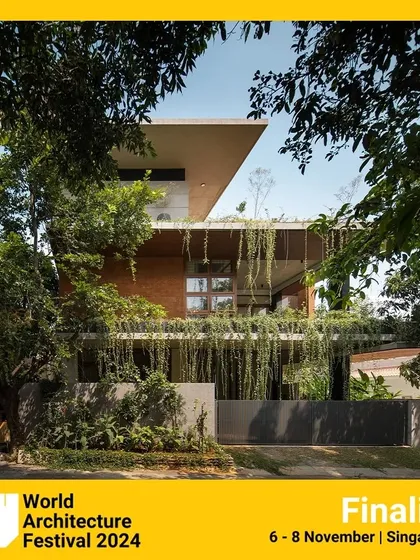 This finalist from the World Architecture Festival shows a home where the facade is covered in lush, cascading greenery, creating a living green curtain.