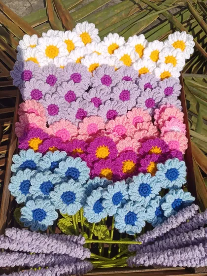 Another view of the crate filled with daisy and lavender stems.