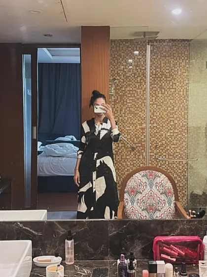 A mirror selfie from the hotel room provided to students. It's important to me that my students feel at home and have a great experience both inside and outside the classroom.