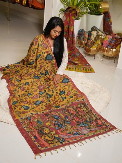 This is a glimpse into my Kalamkari Edition, featuring a wide array of hand-painted dupattas and fabrics from the Indralokam series. Each piece is a unique story, available for you to customize into your dream outfit.