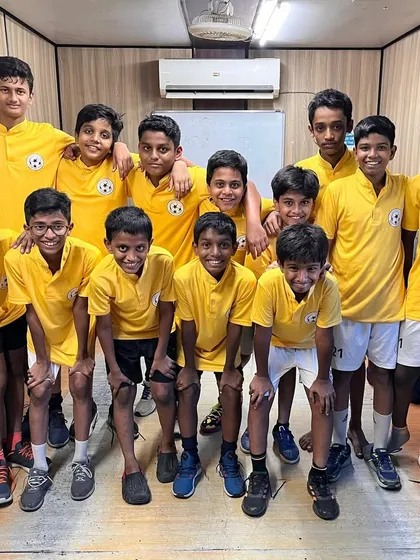 On to the next round! Our U-13 team celebrating after a 2-1 victory against Evolution FC, with goal scorers Daniel and Dishant leading the charge.