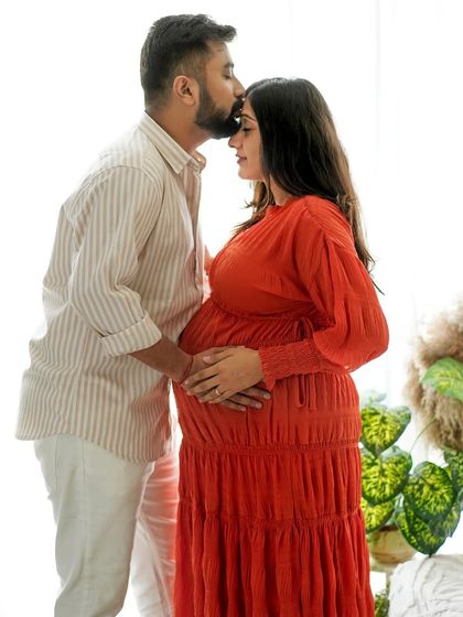 A gentle forehead kiss is a simple but powerful expression of love and protection. We capture these unscripted moments of affection during our couple sessions.