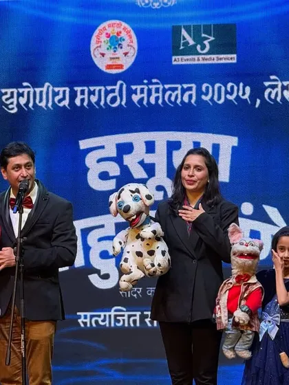 This is what my family's legacy looks like on stage. Performing with my wife Rujuta and our daughter Neeva, the fourth generation of Padhye puppeteers, at the European Marathi Sammelan in Leicester. We bring a century of art and laughter to every show.