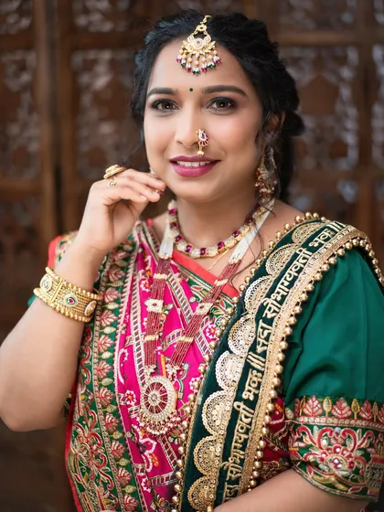 A smiling portrait that shows how confident a client feels with the right traditional makeup.