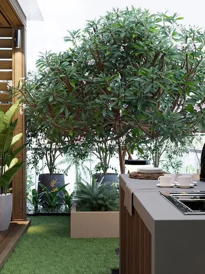 A detailed render focusing on the outdoor kitchen and bar area, set against the backdrop of the vertical garden and mature trees on the Khar terrace.