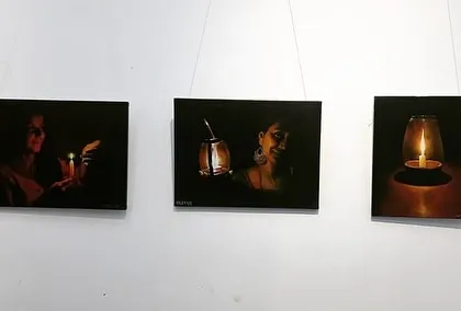 My series of candle-light paintings hung together at the CKP gallery.