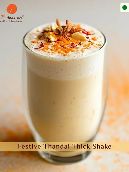 Get into the festive spirit with our seasonal Thandai Thick Shake. This special beverage is a creamy blend of traditional thandai spices, nuts, and saffron, creating a rich and aromatic drink that captures the essence of Indian celebrations like Holi.