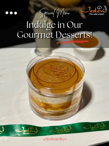 Dive into indulgence with our special gourmet dessert jars. This layered mango dessert is perfectly packaged, showcasing the creamy and fruity layers, ready for you to enjoy anytime, anywhere.