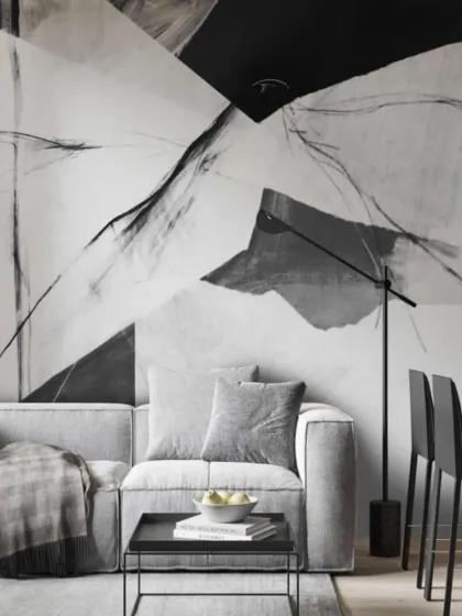 A bold, abstract black and white wallpaper. The sharp lines and contrasting shapes make this a powerful statement piece for any contemporary interior.