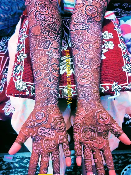 A personalized bridal design with the name 'Zabi' written inside a heart.