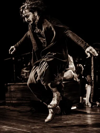 A moment of flight captured on stage. This image embodies the feeling of freedom and raw emotion that I strive to bring to every single performance.