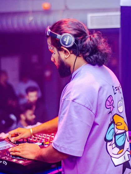 These shots capture me in my element, from different angles and at various events. Each one is a glimpse into my life as a music maker, focused on the craft and connecting with the crowd.