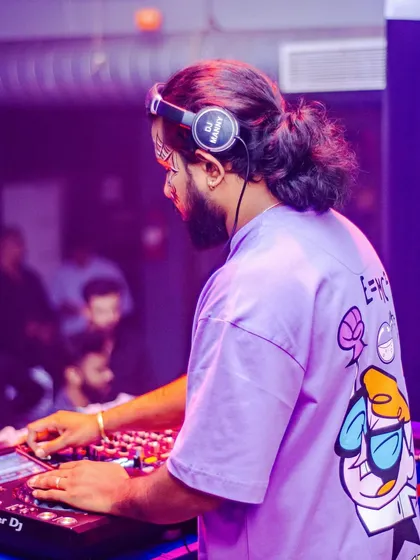 These shots capture me in my element, from different angles and at various events. Each one is a glimpse into my life as a music maker, focused on the craft and connecting with the crowd.