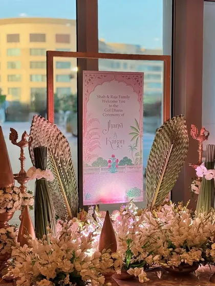 Marking the entrance with fragrant blooms and custom signage. This welcome display combines traditional auspicious elements with a modern, elegant design. 🤍