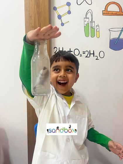 Is it magic or science? This student is amazed that he can hold a bottle upside down with an object inside, all thanks to the power of a vacuum. It's a lesson in air pressure that feels like a magic trick.