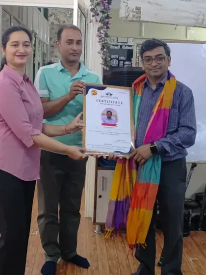 Here I am with Dr. Lalit Gupta, a cardiologist, after our successful Heart Wellness workshop. We believe in a holistic approach to heart health, combining medical insights with the stress-reducing benefits of yoga.