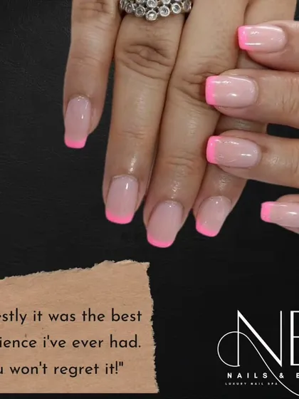 A simple pop of color can transform a classic look. Here, we used a bright neon pink for the tips on these clean, square-shaped nails for a fun and summery vibe.