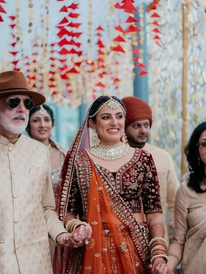 A beautiful moment with my parents during my wedding entry. Their support means the world to me.
