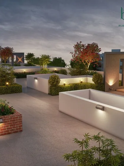 This 3D visualization shows a minimalist and modern terrace design at dusk. The focus is on clean lines, with built-in planter boxes, low hedges, and subtle wall-mounted lights that create a warm and inviting glow.
