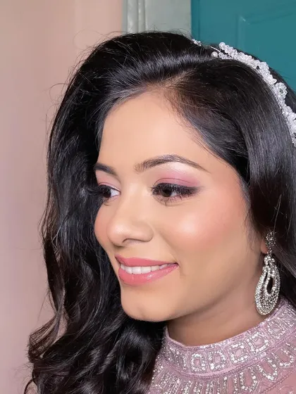 A soft engagement glam look for my bride Neha. The focus was on pink-toned eyeshadow and a natural, skin-like finish.
