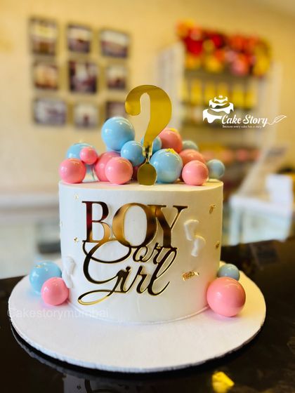 Another look at the elegant gender reveal cake, ready for the big surprise.