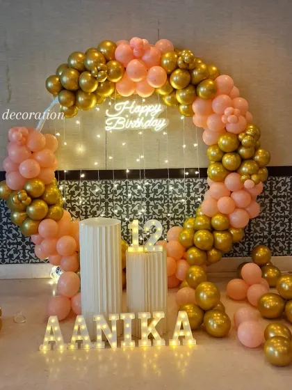 Another angle of the 12th birthday setup, showing the full circular frame and balloon arrangement.
