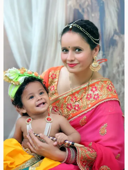 A beautiful mother and son portrait from a Janmashtami photoshoot. We love including parents to capture the special bond and create a complete family memory.