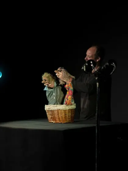 A gentle interaction between two hand puppets in 'Life (VIDA)'. The show is a series of playful, tender, and captivating stories told without words.