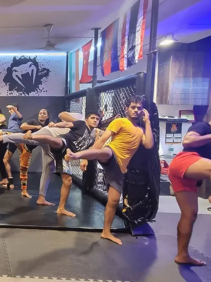 Another angle from our group kick-drilling session. Practicing together in a line helps everyone stay synchronized and motivated, pushing each other to get that extra bit of height and power in every kick.